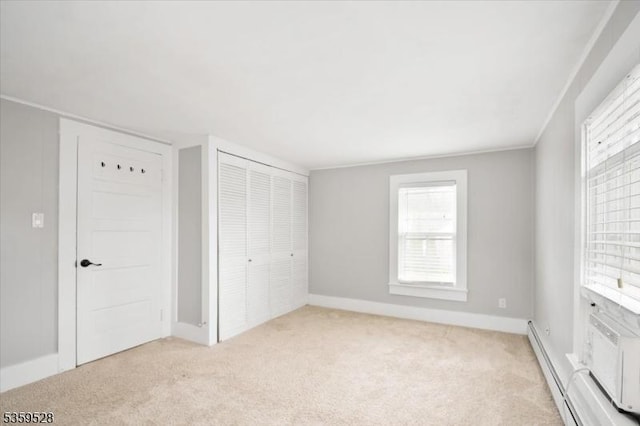 19 Spring St, Ogdensburg Boro, NJ 07439 - unfurnished bedroom with light carpet, a closet, baseboards, and a baseboard heating unit