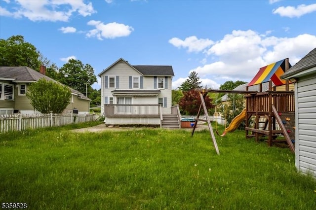 19 Spring St, Ogdensburg Boro, NJ 07439 - back of house with a wooden deck and a playground