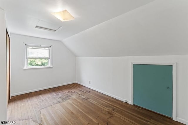 195 Newark Pompton Tpke, Wayne Twp, NJ 07470 - bonus room featuring attic access, hardwood / wood-style floors, and vaulted ceiling