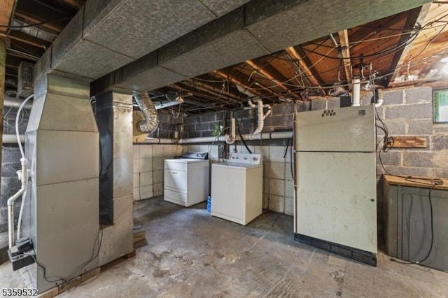 195 Newark Pompton Tpke, Wayne Twp, NJ 07470 - unfinished below grade area featuring freestanding refrigerator, independent washer and dryer, and heating unit