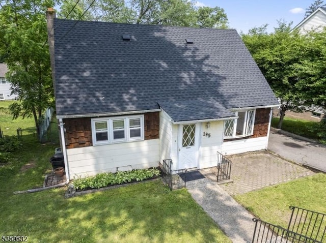 195 Newark Pompton Tpke, Wayne Twp, NJ 07470 - view of front of house featuring roof with shingles and a chimney