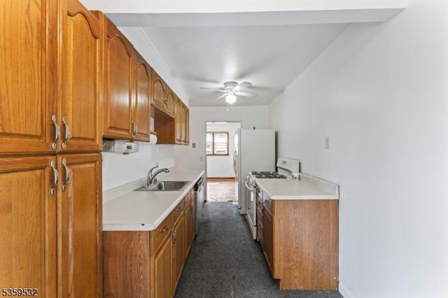 195 Newark Pompton Tpke, Wayne Twp, NJ 07470 - kitchen featuring white gas range oven, a ceiling fan, light countertops, and brown cabinetry