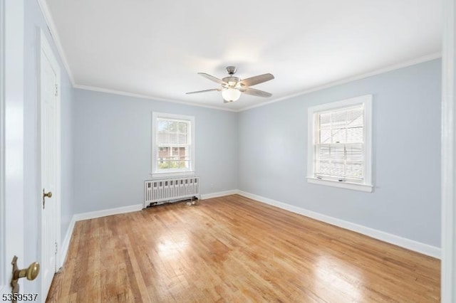 1082 Battle Hill Ter, Union Twp, NJ 07083 - unfurnished room with radiator heating unit, crown molding, light wood-type flooring, baseboards, and a ceiling fan