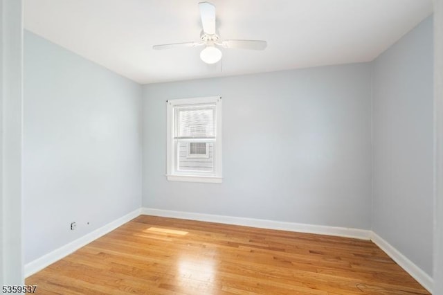 1082 Battle Hill Ter, Union Twp, NJ 07083 - unfurnished room with light wood-style floors, a ceiling fan, and baseboards
