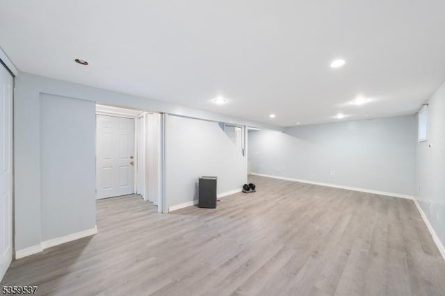 1082 Battle Hill Ter, Union Twp, NJ 07083 - finished basement featuring light wood-type flooring, baseboards, and recessed lighting