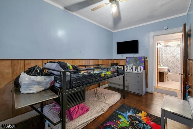 139 Pine Grove Ter, Newark City, NJ 07106 - bedroom with ornamental molding, a wainscoted wall, wood finished floors, and wood walls