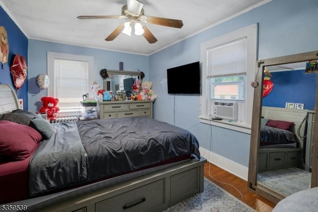 139 Pine Grove Ter, Newark City, NJ 07106 - bedroom featuring cooling unit, ornamental molding, wood finished floors, a ceiling fan, and baseboards