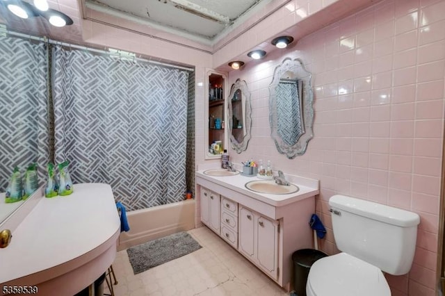 139 Pine Grove Ter, Newark City, NJ 07106 - full bathroom with toilet, double vanity, tile walls, and shower / bath combination with curtain