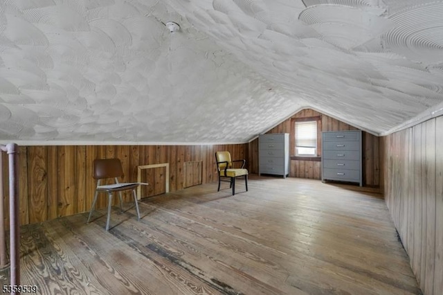 139 Pine Grove Ter, Newark City, NJ 07106 - bonus room featuring light wood-style floors, vaulted ceiling, and wooden walls