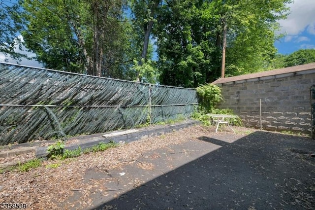 139 Pine Grove Ter, Newark City, NJ 07106 - fenced backyard with a patio