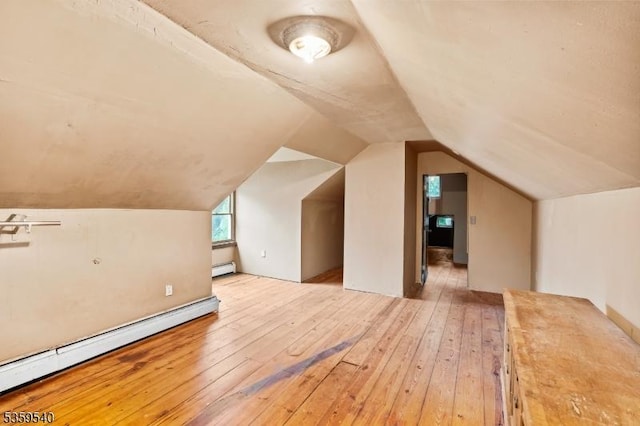 27 Wertsville Rd, East Amwell Twp, NJ 08551 - bonus room with a baseboard heating unit, wood-type flooring, and lofted ceiling