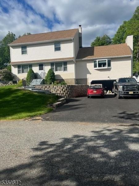 2 Erin Ln, Vernon Twp, NJ 07422 - townhome / multi-family property with a chimney