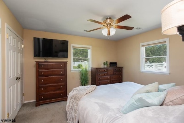 3 Cumberland Rd, Hillsborough Twp, NJ 08844 - bedroom featuring multiple windows, light carpet, ceiling fan, and baseboards