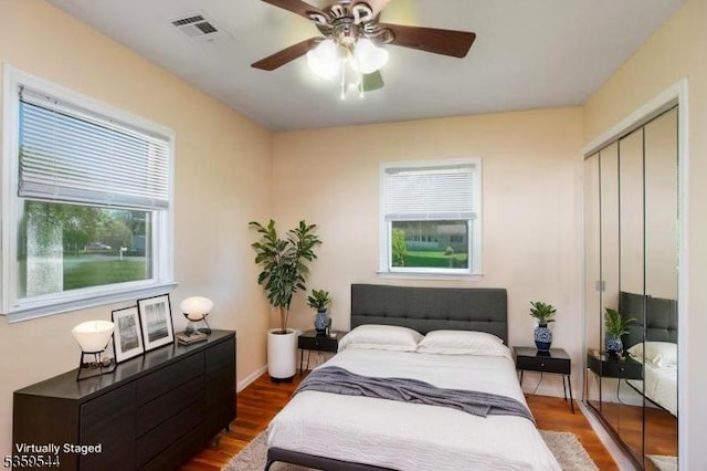 3 Cumberland Rd, Hillsborough Twp, NJ 08844 - bedroom with a closet, dark wood-style flooring, and ceiling fan