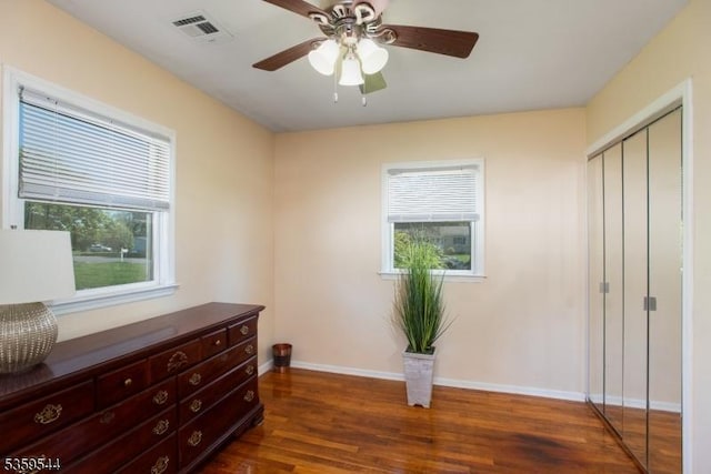 3 Cumberland Rd, Hillsborough Twp, NJ 08844 - bedroom with dark wood-style floors, multiple windows, baseboards, and a closet
