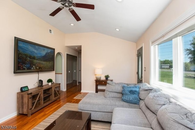 3 Cumberland Rd, Hillsborough Twp, NJ 08844 - living area featuring lofted ceiling, light wood-style floors, ceiling fan, arched walkways, and baseboards