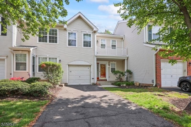 256 Marcia Way, Bridgewater Twp, NJ 08807 - view of property with driveway, a balcony, and a garage