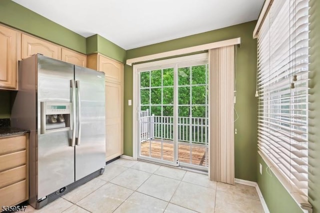 256 Marcia Way, Bridgewater Twp, NJ 08807 - kitchen featuring stainless steel refrigerator with ice dispenser, baseboards, light tile patterned floors, and light brown cabinets