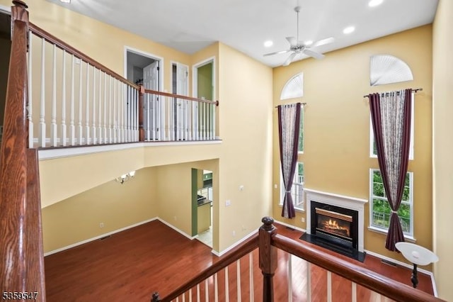 256 Marcia Way, Bridgewater Twp, NJ 08807 - stairway with wood finished floors, recessed lighting, a ceiling fan, baseboards, and plenty of natural light