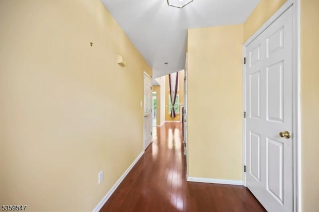 256 Marcia Way, Bridgewater Twp, NJ 08807 - hallway featuring baseboards and dark wood-style flooring