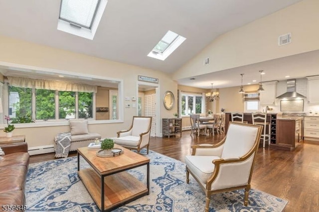 55 Nomahegan Ct, Cranford Twp, NJ 07016 - living room with a skylight, a baseboard radiator, dark wood finished floors, a chandelier, and high vaulted ceiling