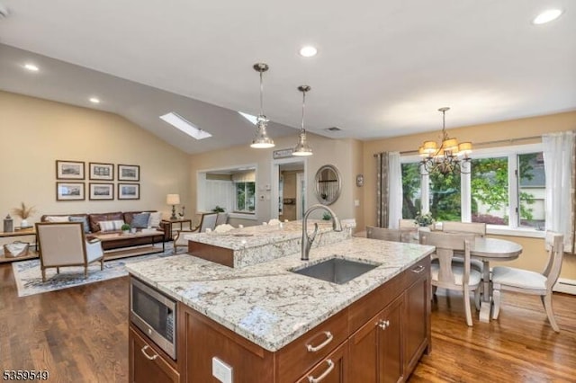 55 Nomahegan Ct, Cranford Twp, NJ 07016 - kitchen featuring a sink, stainless steel microwave, dark wood-type flooring, decorative light fixtures, and recessed lighting