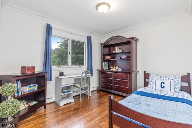 55 Nomahegan Ct, Cranford Twp, NJ 07016 - bedroom with wood finished floors, ornamental molding, and baseboard heating