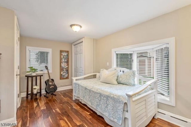 55 Nomahegan Ct, Cranford Twp, NJ 07016 - bedroom with dark wood-style flooring and baseboards