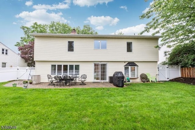 55 Nomahegan Ct, Cranford Twp, NJ 07016 - rear view of property with a gate, a patio, and a chimney