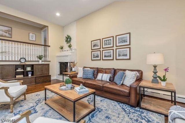 55 Nomahegan Ct, Cranford Twp, NJ 07016 - living room featuring wood finished floors, baseboards, a baseboard heating unit, recessed lighting, and a fireplace