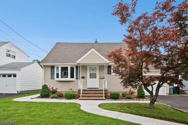 184 Locust Dr, Union Twp, NJ 07083 - view of front of home featuring a front lawn, driveway, and a shingled roof