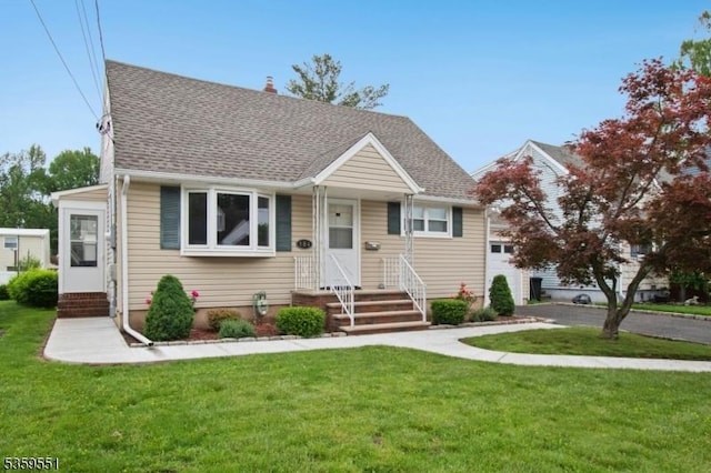 184 Locust Dr, Union Twp, NJ 07083 - bungalow-style house with a front lawn and roof with shingles