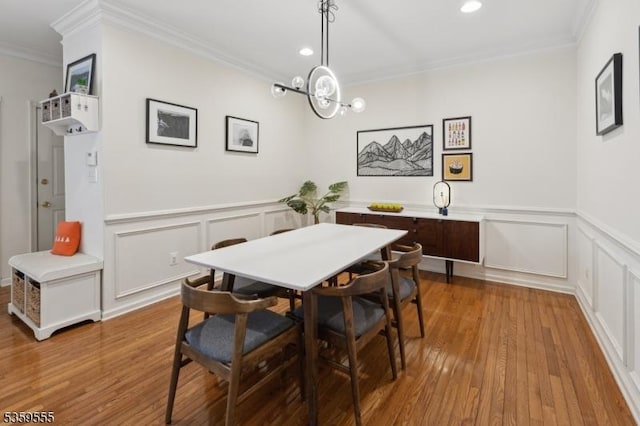 3 Merchant Ct, Bernards Twp, NJ 07920 - dining area featuring ornamental molding, wood-type flooring, a decorative wall, wainscoting, and recessed lighting