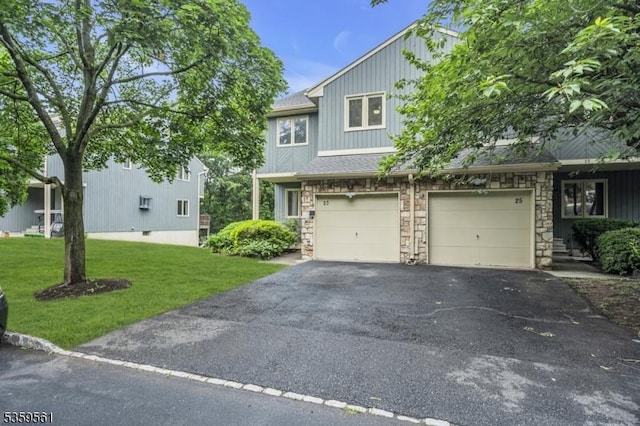 23 Bond St, Bridgewater Twp, NJ 08807 - view of front of house with driveway, a front lawn, a garage, and stone siding