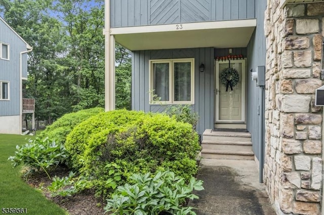23 Bond St, Bridgewater Twp, NJ 08807 - entrance to property featuring board and batten siding
