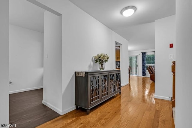 23 Bond St, Bridgewater Twp, NJ 08807 - hall with wood-type flooring and baseboards