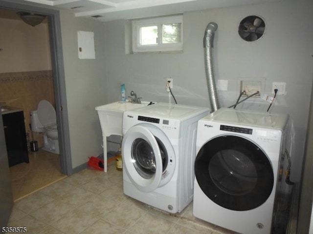 300 Jefferson Ave, Rahway City, NJ 07065 - laundry room with light tile patterned floors and independent washer and dryer