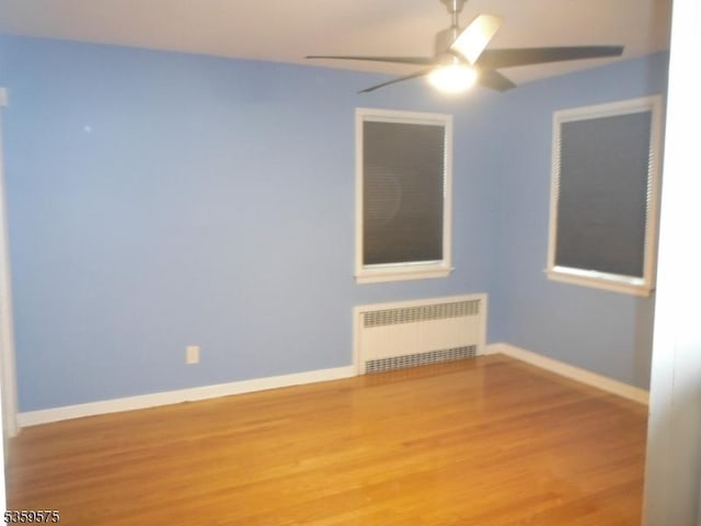 300 Jefferson Ave, Rahway City, NJ 07065 - empty room with radiator, a ceiling fan, wood finished floors, and baseboards