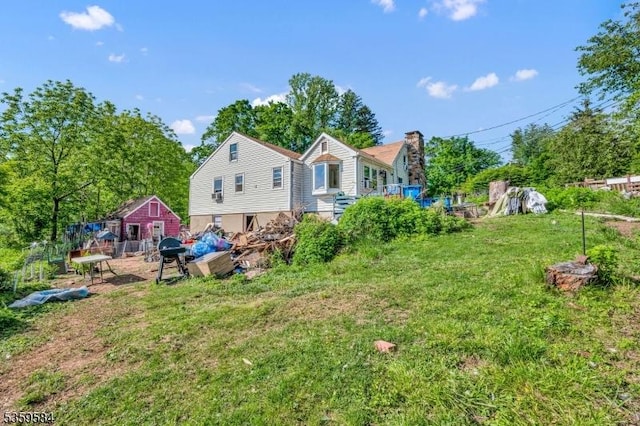 1 David Post Rd, Clinton Twp, NJ 08801 - rear view of house featuring a lawn