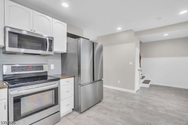 10 Rutgers Way, Hopatcong Boro, NJ 07843 - kitchen with stainless steel appliances, white cabinets, baseboards, and recessed lighting