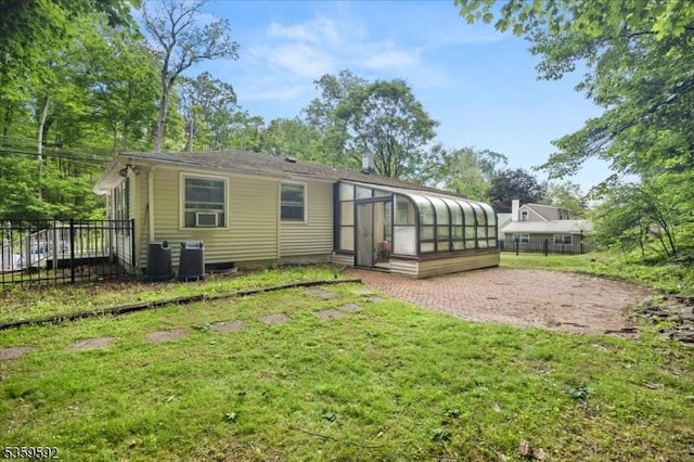 59 Old Croton Rd, Raritan Twp, NJ 08822 - rear view of property with a sunroom and cooling unit