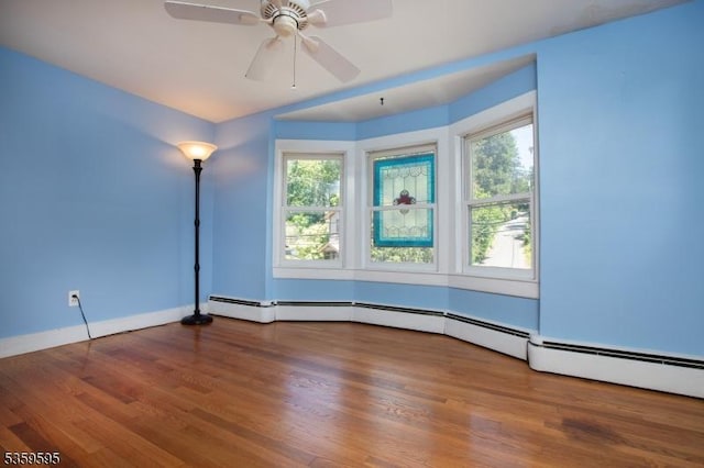 8 S Main St, Stockton Boro, NJ 08559 - empty room with plenty of natural light, wood finished floors, baseboards, and ceiling fan