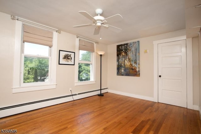 8 S Main St, Stockton Boro, NJ 08559 - spare room featuring wood finished floors, a baseboard radiator, baseboards, and ceiling fan