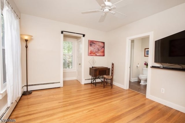 8 S Main St, Stockton Boro, NJ 08559 - bedroom featuring a baseboard radiator, light wood-type flooring, and baseboards