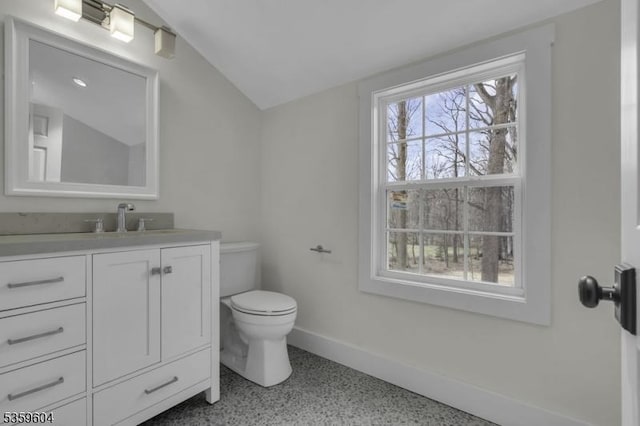 129 Sandy Ridge Rd, Delaware Twp, NJ 08559 - bathroom featuring vanity, toilet, baseboards, speckled floor, and lofted ceiling