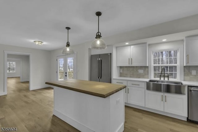 129 Sandy Ridge Rd, Delaware Twp, NJ 08559 - kitchen featuring stainless steel appliances, a sink, tasteful backsplash, healthy amount of natural light, and recessed lighting