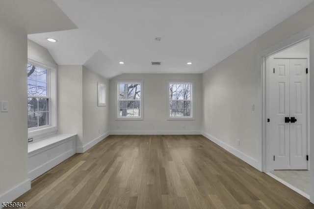 129 Sandy Ridge Rd, Delaware Twp, NJ 08559 - unfurnished room with wood finished floors, baseboards, recessed lighting, and vaulted ceiling