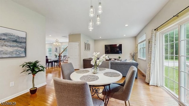 612 Magnolia Rd, North Brunswick Twp, NJ 08902 - dining room featuring a chandelier, light wood finished floors, baseboards, and recessed lighting