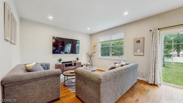 612 Magnolia Rd, North Brunswick Twp, NJ 08902 - living room featuring wood finished floors, recessed lighting, and baseboards