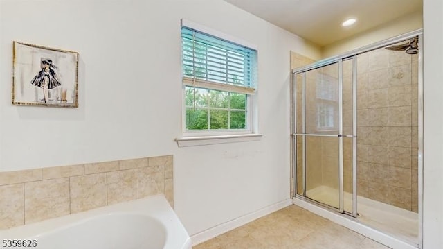 612 Magnolia Rd, North Brunswick Twp, NJ 08902 - bathroom featuring a shower stall, a bath, baseboards, tile patterned flooring, and recessed lighting